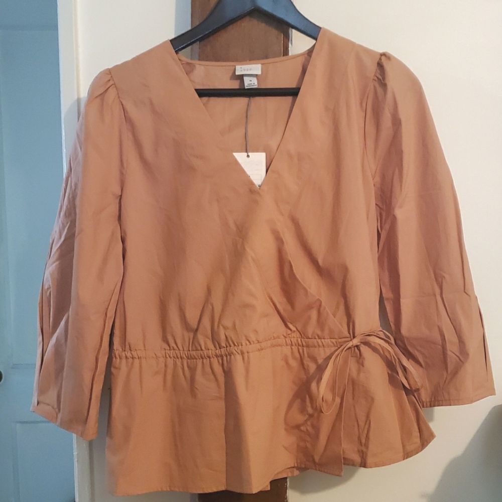 A new day wrap blouse size medium in pink